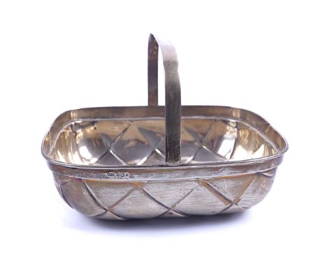 A SILVER BASKET OF CURVED RECTANGULAR FORMWith a central handle, Sheffield 1909, length 21cm, weight 399 gms