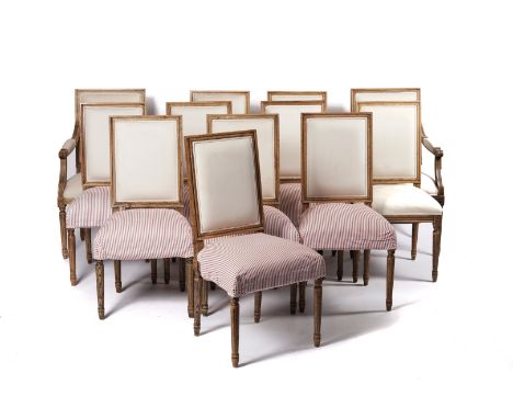 OKA; A SET OF TWELVE LOUIS XVI STYLE OAK FRAMED SQUARE BACK DINING CHAIRS (12)On fluted turned supports, to include a pair of