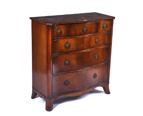 A GEORGE III STYLE MAHOGANY SERPENTINE CHESTWith three short over three long graduated drawers, on bracket feet, 99cm wide; 1