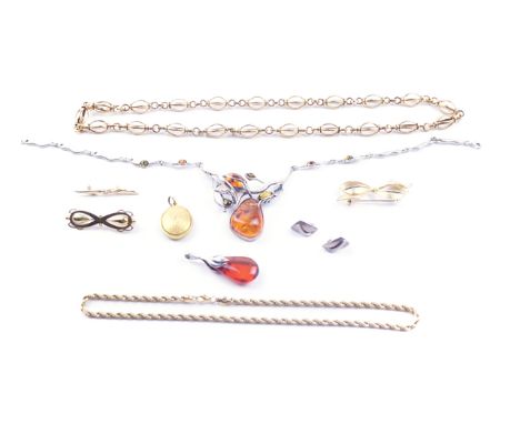 A GROUP OF JEWELLERY (9)Comprising; a gilt metal bow brooch, a silver and reconstituted amber necklace detailed 925, a drop s