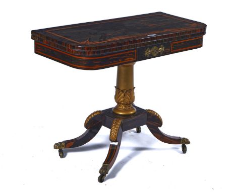 A REGENCY SATINWOOD BANDED COROMANDEL CARD TABLEOn gilt decorated leaf carved column and four downswept supports, 92cm wide; 