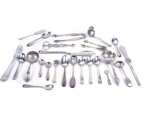 A GROUP OF SILVER FLATWARE AND FURTHER ITEMS (24)Comprising; a pair of sugar nips, two pairs of sugar tongs, a sugar sifting 