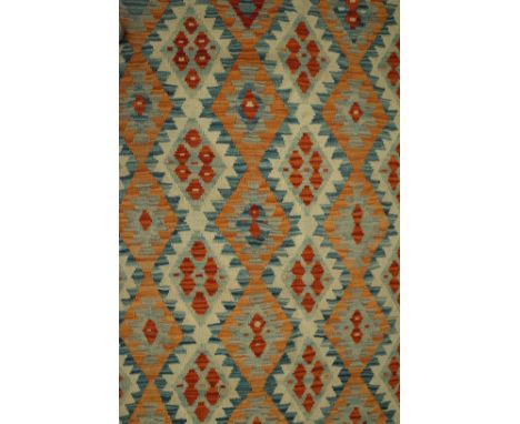 AN ANATOLIAN DESIGN KILIM CARPETThe field with an all over design of columns of diamond motifs, a pale indigo diamond border,