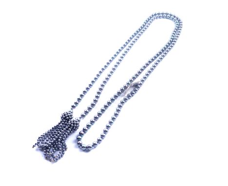 A MAJORCA BLACK TINTED IMITATION PEARL SAUTOIREWith pendant tassels to the terminals