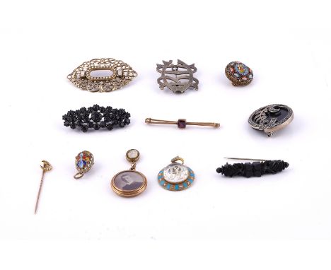 TWELVE ITEMS OF JEWELLERY (12)Comprising; a Victorian reverse monogrammed crystal, pale blue enamelled and half pearl set cir