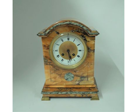 A FRENCH GIALLO SIENA AND CIPOLLINO MARBLE MOUNTED MANTEL CLOCKLate 19th CenturyWith arched case above the enamel chapter rin