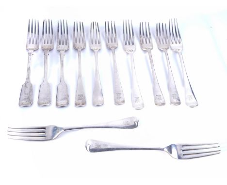 TWELVE SILVER TABLE FORKS (12)Comprising; four Old English pattern, Sheffield 1914, four Old English pattern, London 1804, an