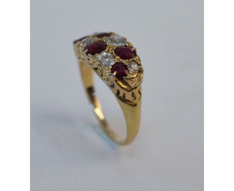 A GOLD, RUBY AND DIAMOND RINGMounted with five cushion shaped rubies alternating with five cushion shaped diamonds, the mount