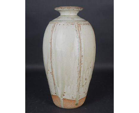 RICHARD BATTERHAM ( 1936-2021) A TALL STONEWARE VASEVertical ribbed  panelled sides covered in a celadon ash glaze, unsigned,
