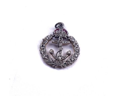 A DIAMOND AND RED ENAMELLED PENDANTDesigned as an anchor with a crown surmount and a wreath, mounted with rose cut diamonds a
