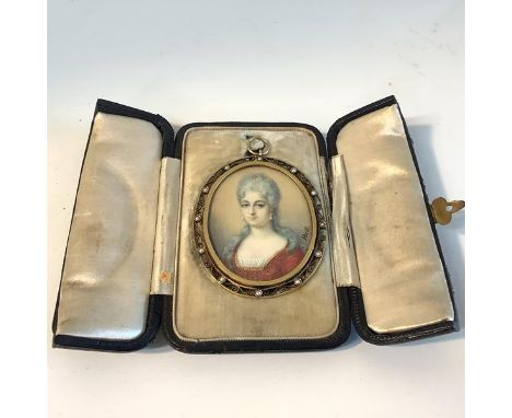 A portrait miniature of a lady in 18th century costume, late 19th century, signed "Hall", watercolour on ivory, in a pierced 