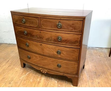 A Regency mahogany and boxwood strung bowfront chest, the caddy top above two short and three long drawers, above an apron wi
