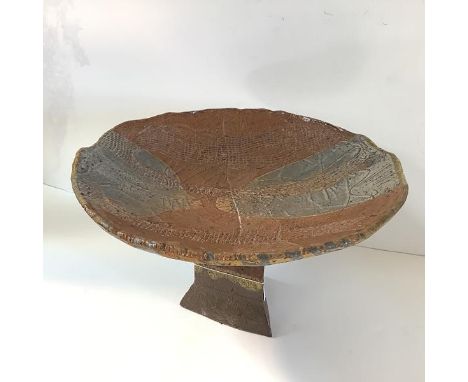 David R. Taylor (Contemporary), a stoneware tazza, incised and in relief with naturalistic patterns, painted mark to the base