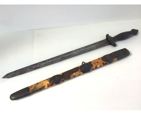 A Chinese "Jian" short sword, 19th century, with fluted wooden grip above shou crosspiece, with double-edged steel blade, in 