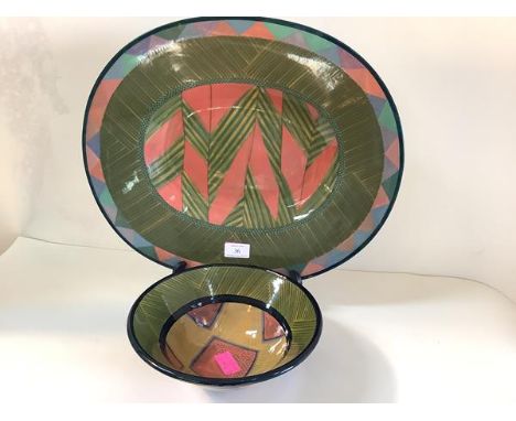 Pauline Zelinski (British, Contemporary), two ceramic pieces comprising an oval serving platter, polychrome painted in a geom