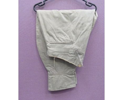 Pair of WW1 Pattern Officer's Breeches khaki, light cotton, wide leg, high V back breeches. Side slash pockets. Small hip poc