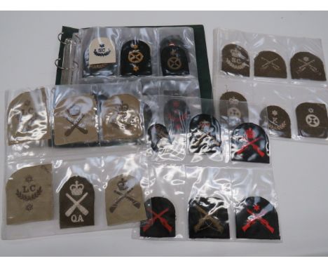 Selection of Royal Marine Trade and Other Ranks trade include white embroidery on khaki QC SC in wreath... Star K in wreath..
