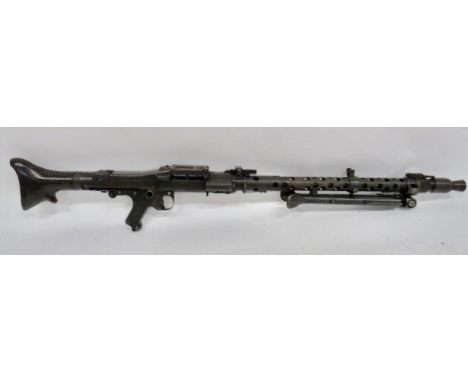 Deactivated German MG34 Light Machine Gun 7.92 mm barrel with front blued flash hider. Blued steel barrel shroud with side mo