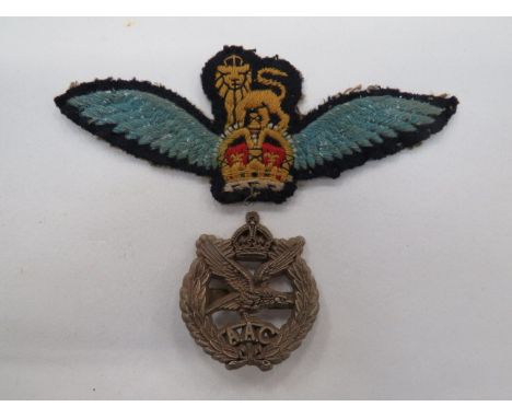 WW2 Army Air Corps Pilot's Wing and Plastic Economy Cap Badge consisting KC embroidery 1st Pilot flat wing. Removed from tuni