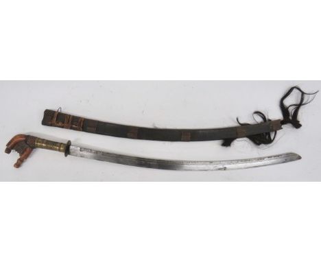 Burmese Dha Head Hunter's Sword 27 inch, single edged, slightly curved Damascus blade. Double rear fuller. Brass ribbed grip.