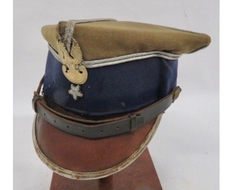 Polish Rogatywka Officer's Cap square khaki crown with silver cord cross and edging. Lower blue felt band. Brown composite pe
