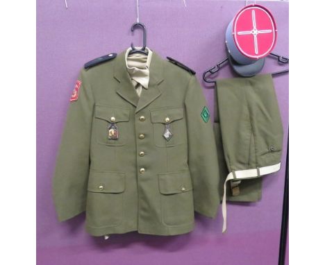 Post War French Foreign Legion Uniform khaki, single breasted, open collar tunic. Black shoulder straps with embroidery rank.