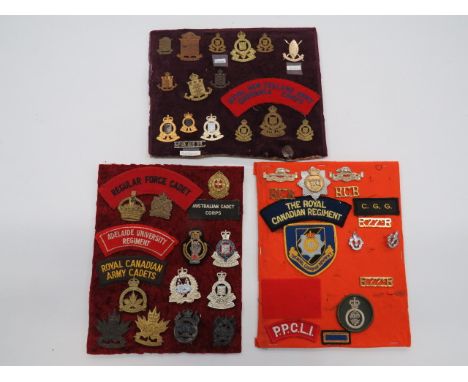Selection of Commonwealth Badges cap badges include QC silvered Royal Australian Armoured Corps... QC anodised Royal NZ Armou