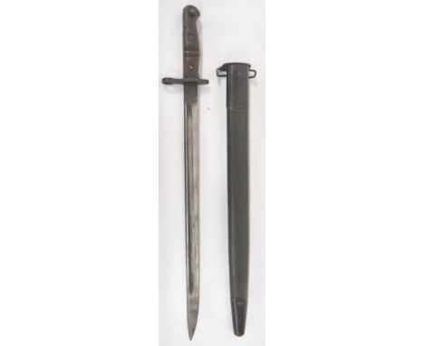 USA Made P14 Bayonet 17 inch, single edged blade with narrow fuller. The forte with British Ordnance stamps and maker "W" for