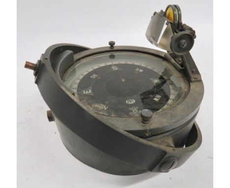 British Naval Pattern Compass large, grey painted brass case. The top glazed frame stamped "Patt 1950" and "8444K". The frame