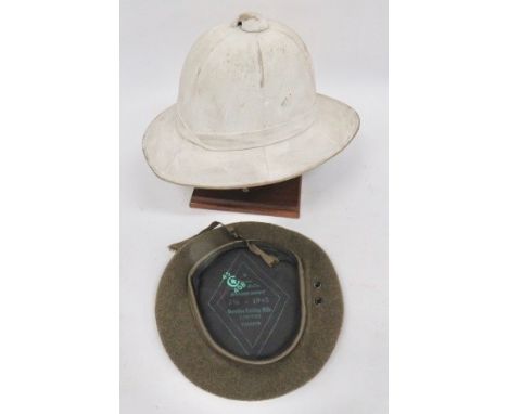 WW2 British Pith Helmet and Beret consisting white blancoed, six panel crown, pith helmet. Pointed peak and square rear brim.