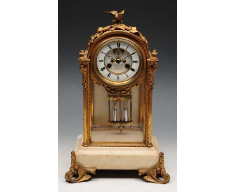 A 19TH CENTURY FRENCH GILT METAL AND MARBLE MANTEL CLOCK by Raingo Freres, Paris, the white enamel dial with visible escapeme