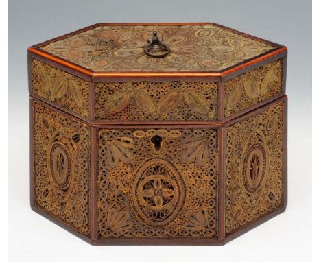 A GEORGE III PAPER SCROLLWORK AND BOX STRUNG TEA CADDY of lozenge shape, the interior with single lidded compartment, 18.5cm 