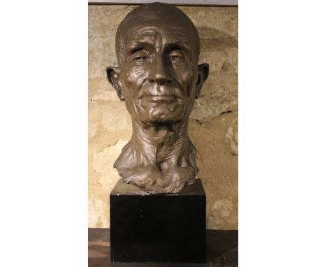 ALFRED GILBERT (1854-1934) A plaster bust of the original self portrait, mounted on an ebonised plinth, 36cm high