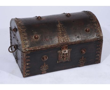 A 19TH CENTURY INDIAN DOME TOP TRUNK OR CASKET with metal mounts and hasp, 65cm wide