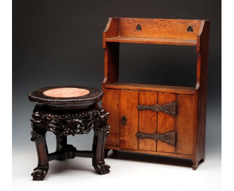 A CHINESE CARVED HARDWOOD JARDINIERE STAND with pink marble inset top, 28cm diameter; and an oak Arts & Crafts style small wa