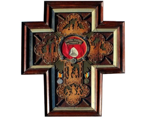 A FRAMED MONTAGE IN THE FORM OF A CROSS RELATING TO 55962 1.A.M.G. BURRELL R.A.F. with various items relating to the career o