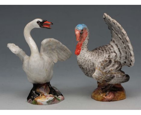 A MEISSEN PORCELAIN MODEL of a turkey cock with raised tail feathers, damage to beak, 11cm high and a Meissen porcelain model
