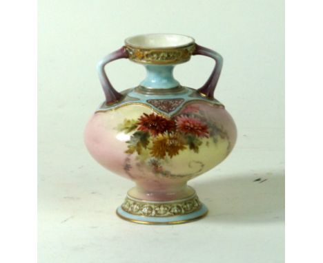 Royal Worcester twin handled hand-highlighted vase
Decorated with flower heads and foliate, factory marks to base, height 11c