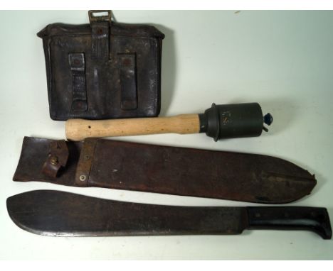 An American Legitimus machete dated 1943, complete with scabbard
German stick grenade, collection of leather magazine pouches