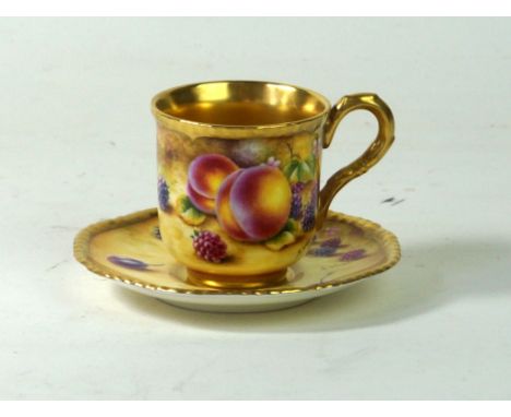 Royal Worcester hand-painted coffee can and saucer
Decorated with fruit, by S. Wood, black factory marks to base
