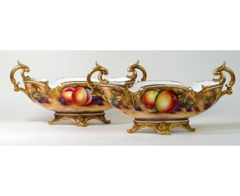 Royal Worcester, pair of twin handled hand-painted pedestal bowls
Each decorated with fruit, by David. R. Bowkett, shape numb
