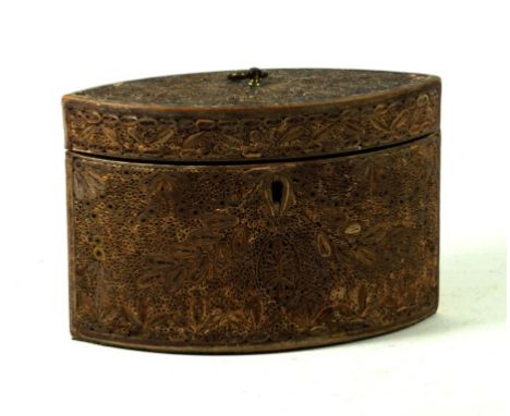 A Georgian scrollwork tear dropped shaped tea caddy late 18th Century
The side and lid with extensive scrollwork decoration, 