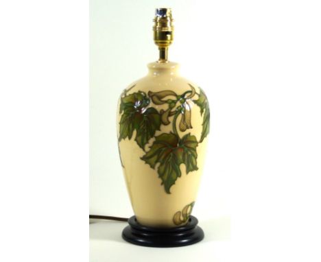 Modern Moorcroft pottery table lamp of cylindrical form
Decorated in the autumn leaves pattern, height (excluding fitting) 24