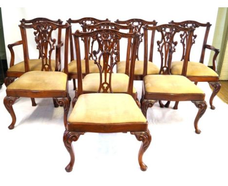 A set of eight heavy quality Chippendale style hardwood dining chairs, 20th Century
Comprising two carvers and six singles, e