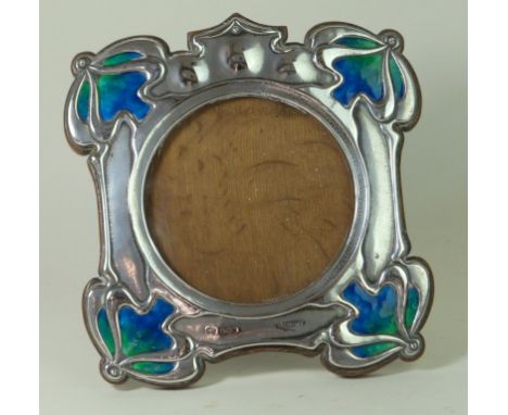 Edward VII Art Nouveau hallmarked silver and enamel photograph frame
Of square form with four green and blue enamel corners d