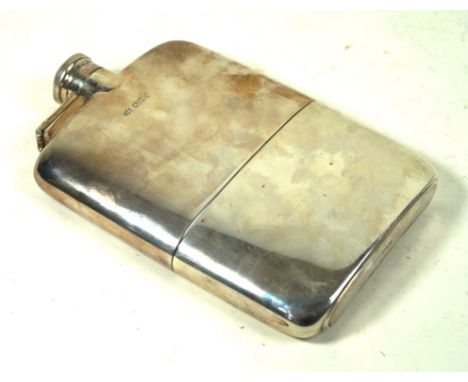 A George V silver hip flask
Of plain rectangular form, with rounded shoulders and removable cup by Mappin & Webb, Sheffield 1