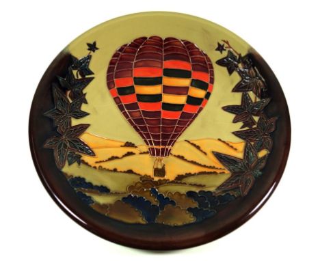 A modern Moorcroft limited edition circular charger
Decorated in the Autumn Balloon pattern, 'Specially commissioned by R & R