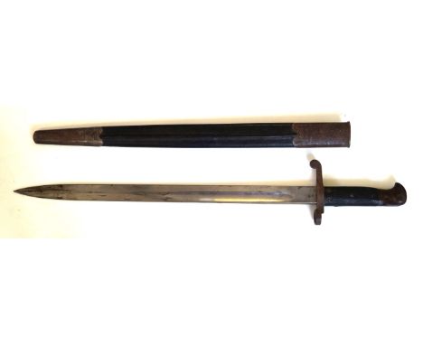 An 1887 Mk III bayonet
46.5cm straight single edged single fullered blade, War Dept marks with Queen Victoria cypher surmount