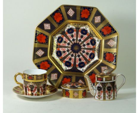 Royal Crown Derby, pattern number 1128
To include octagonal plate, diameter 22.5cm, miniature teapot, height 8cm, coffee can 