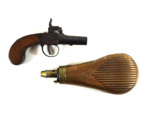 A percussion cap turn off barrel pocket pistol, mid 19th Century
5cm barrel, engraved lock with wooden slab butt, copper and 